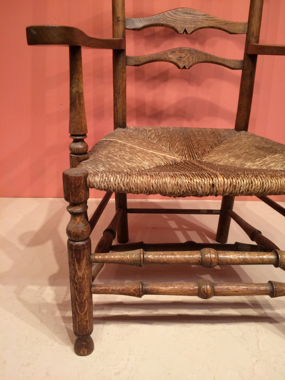 19th century oak Arts and Crafts ladderback armchair. View II