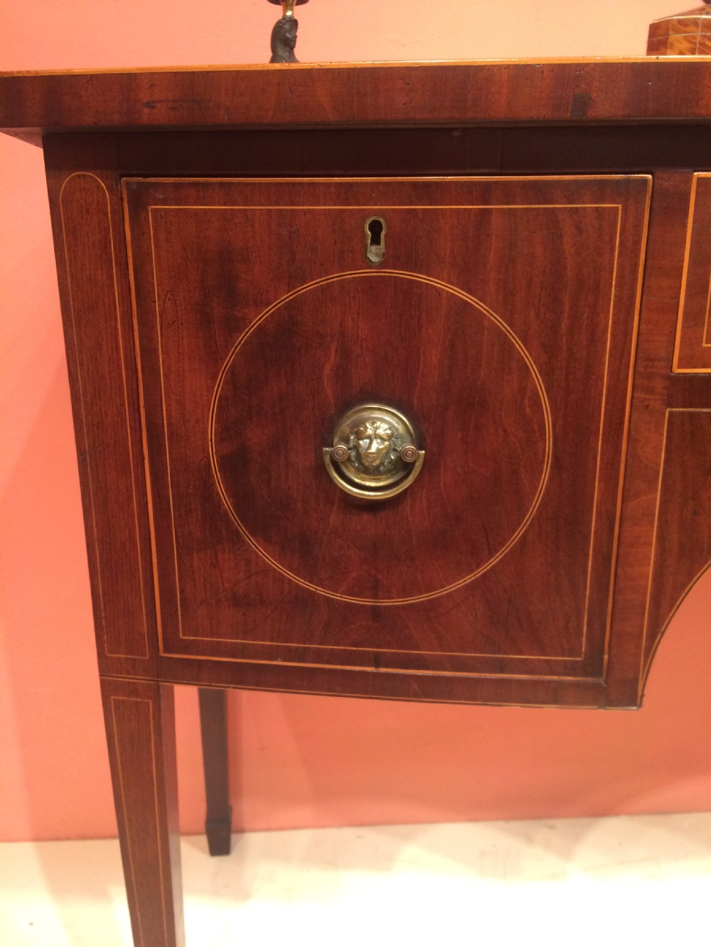 Small Georgian mahogany bow fronted sideboard.  View II