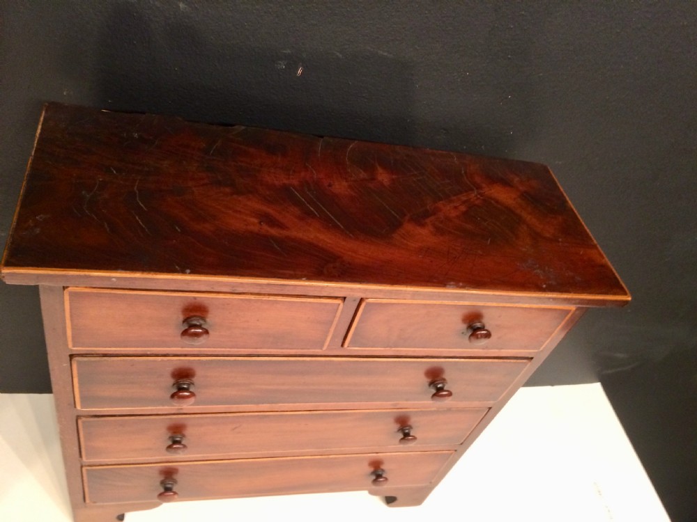 Georgian mahogany miniature chest of drawers. View II