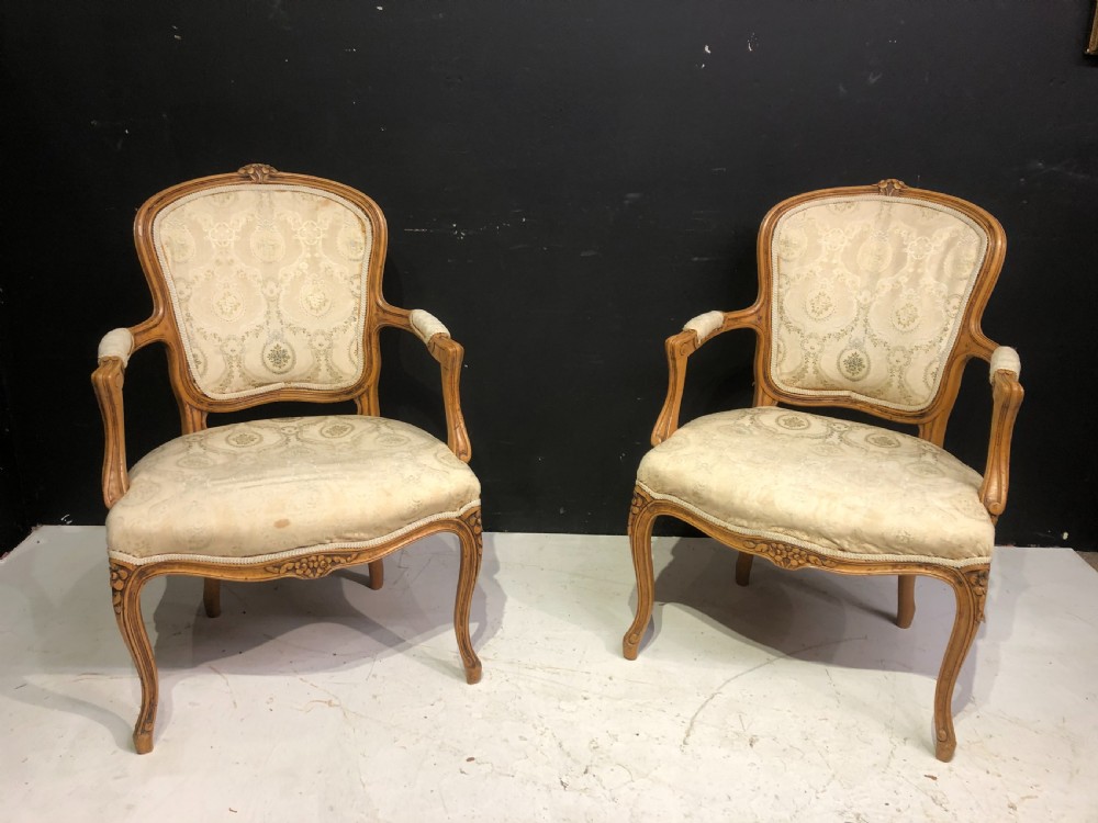 Pair of French carved beechwood armchairs.