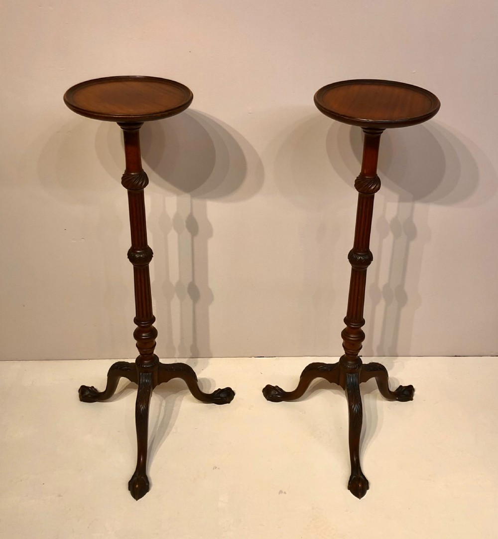 Pair of 19th century carved mahogany torcheres.