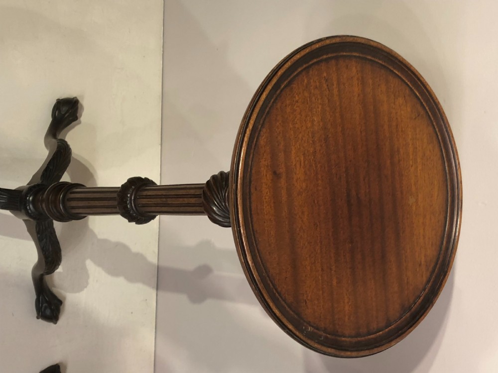 Pair of 19th century carved mahogany torcheres. View VIII