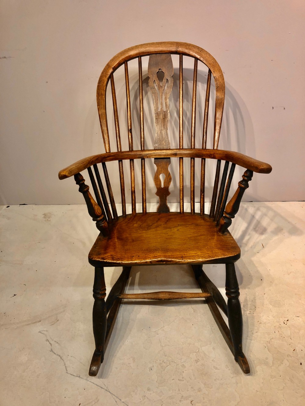 Antique ash and elm rocking chair.