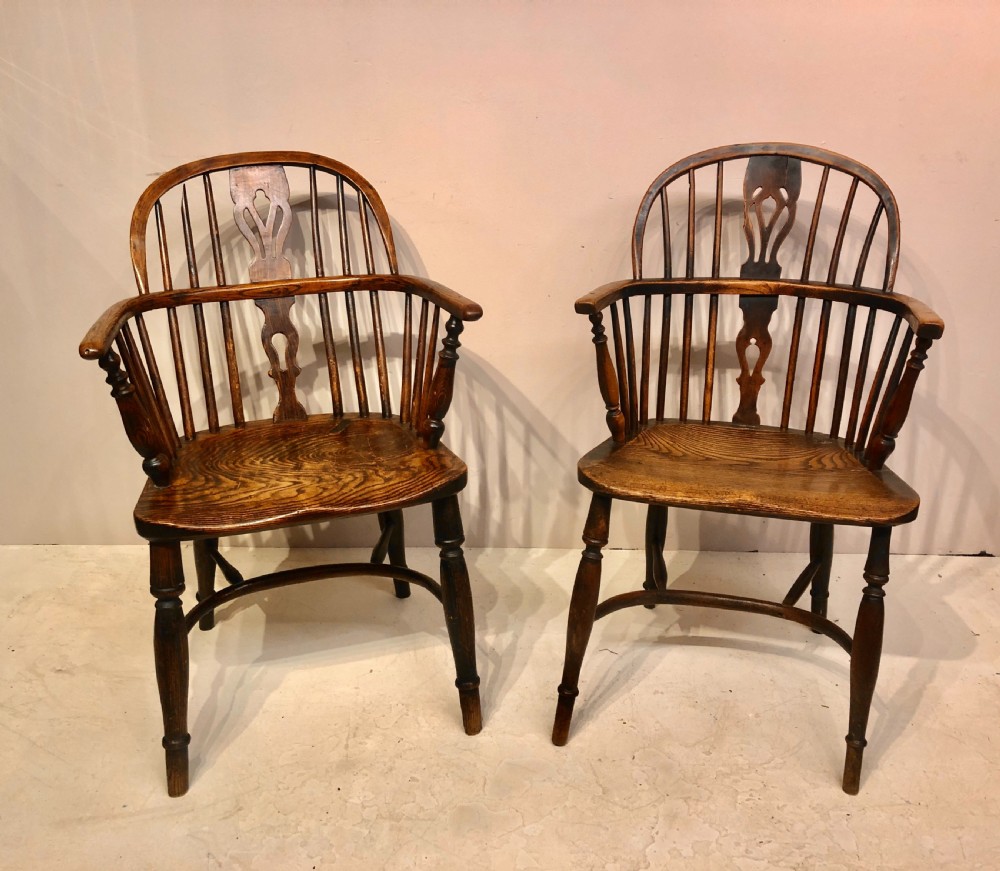 2 Georgian ash and elm low back Windsor armchairs. 