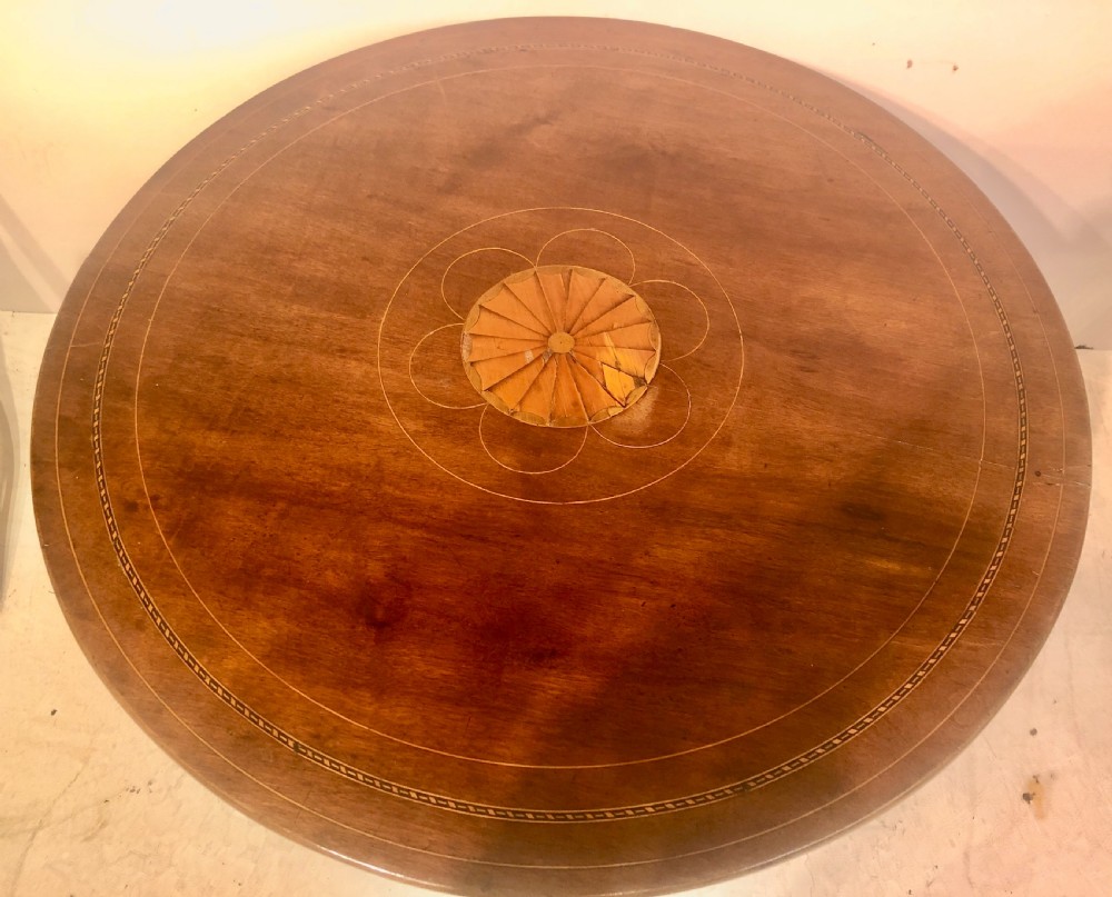 19th century tilt top mahogany tripod table. View III