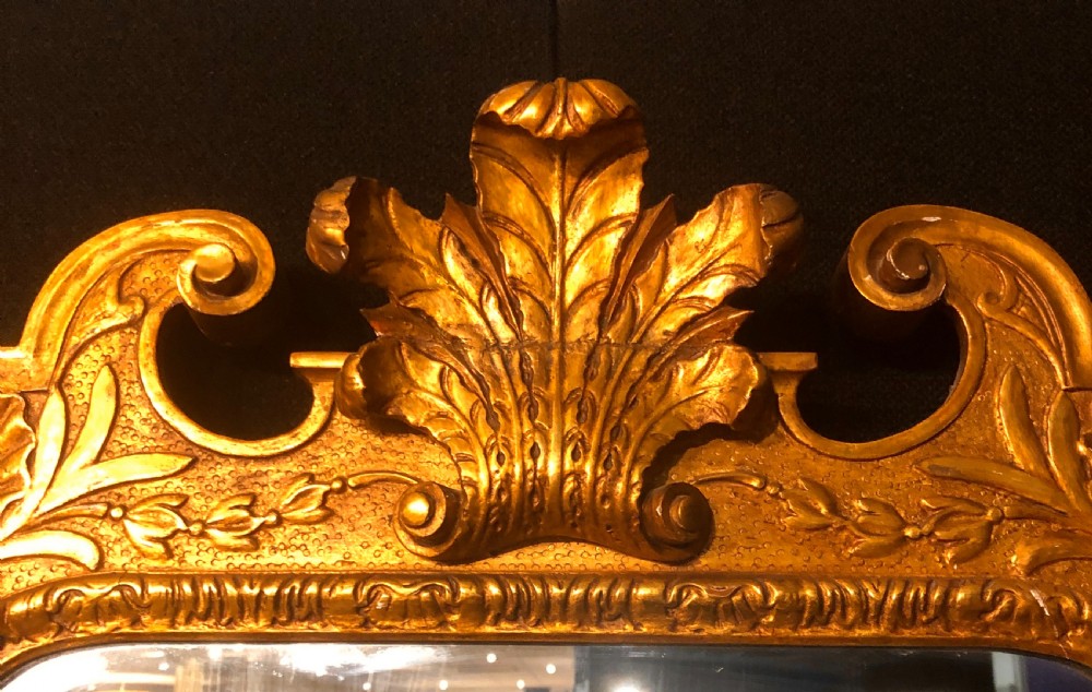 Geo II style carved giltwood wall mirror. View II