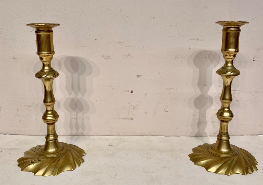 Pair of Georgian brass candlesticks.