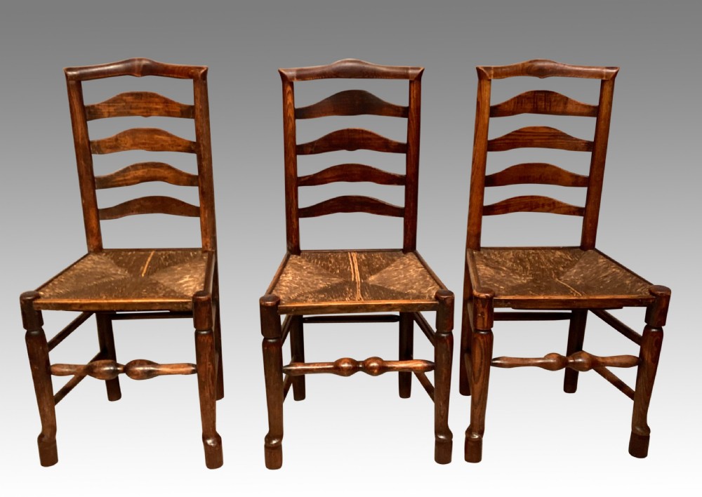 Set of 8 antique Lancashire rush seat chairs. View II