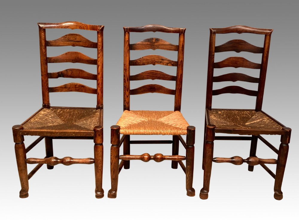 Set of 8 antique Lancashire rush seat chairs. View III