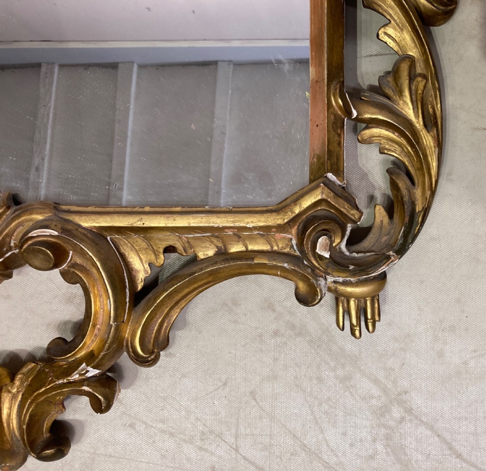 Chippendale style carved giltwood wall mirror. View IV