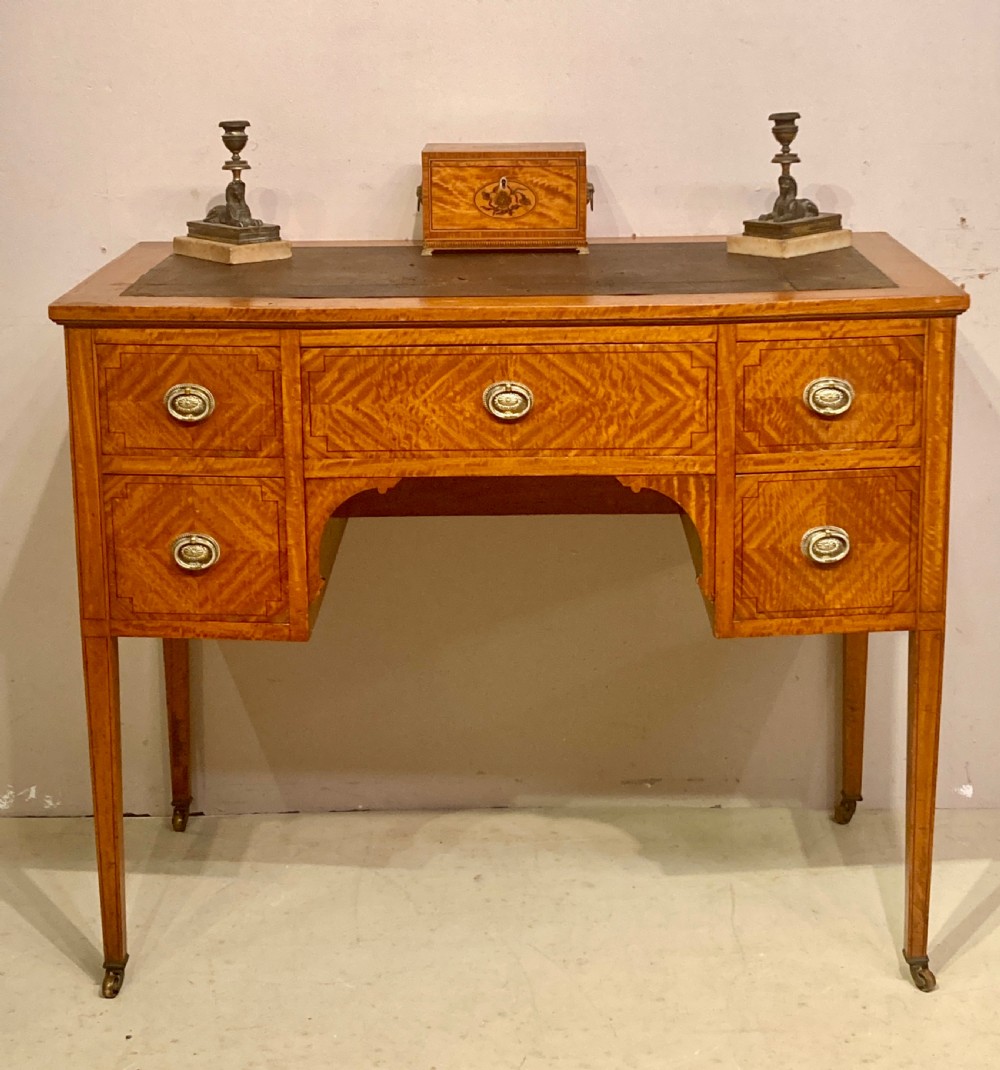 19th century satinwood kneehole desk.