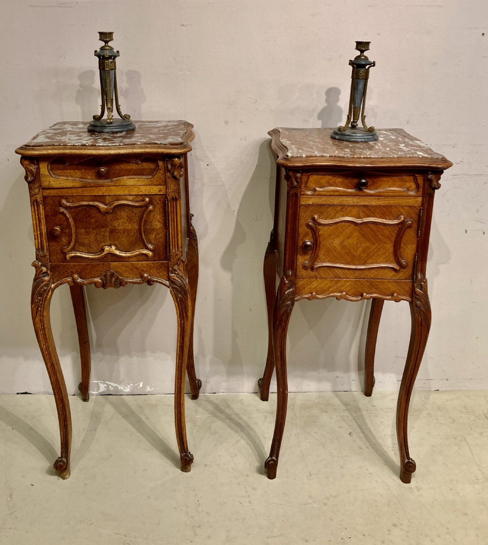 Matched pair of 19th century French bedside tables. View II