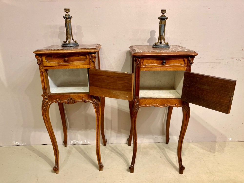 Matched pair of 19th century French bedside tables. View V