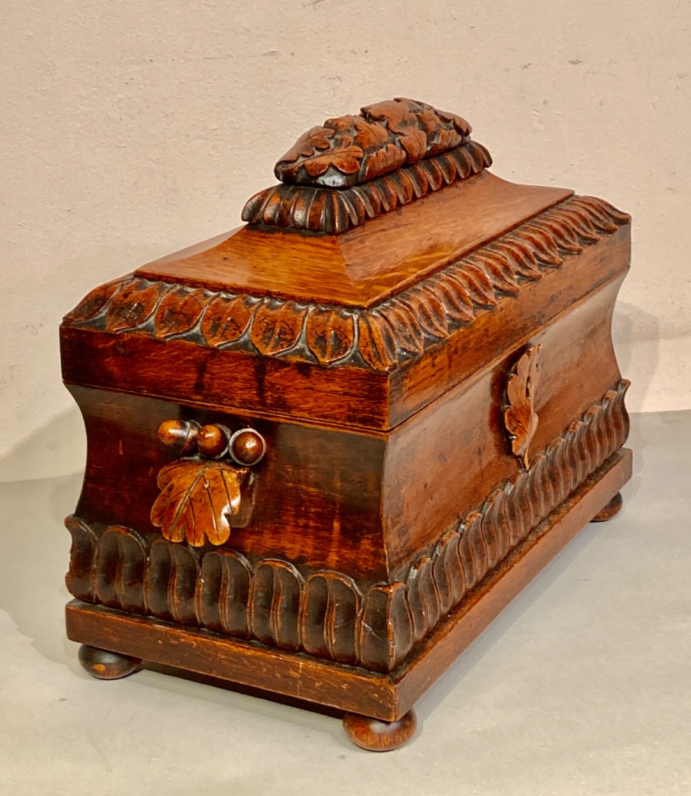 Large Victorian carved oak tea caddy.