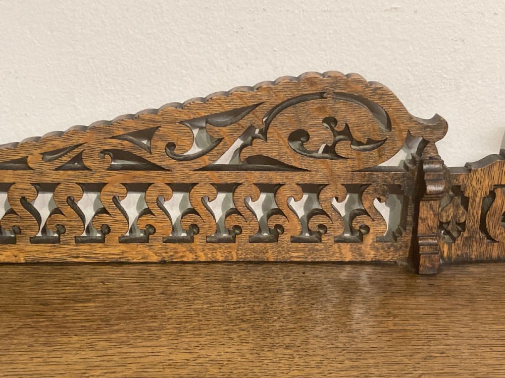 Antique oak waterfall bookcase. View V