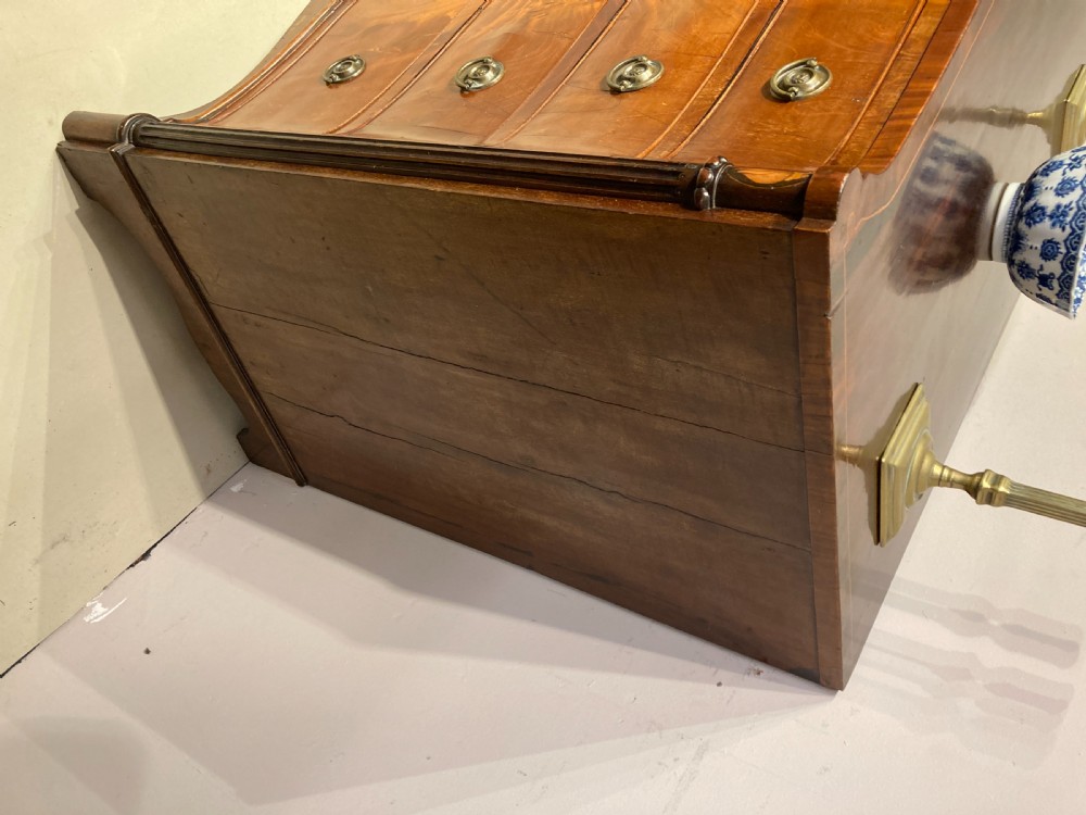 Antique serpentine  mahogany chest of drawers. View IV