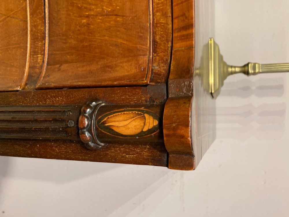 Antique serpentine  mahogany chest of drawers. View V