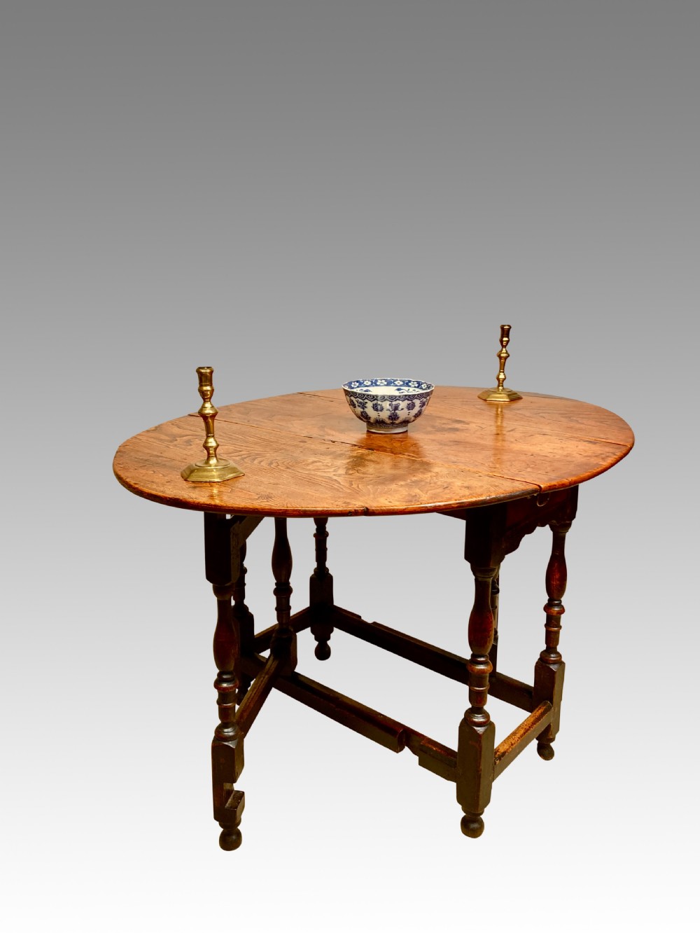Georgian elm gate leg table.