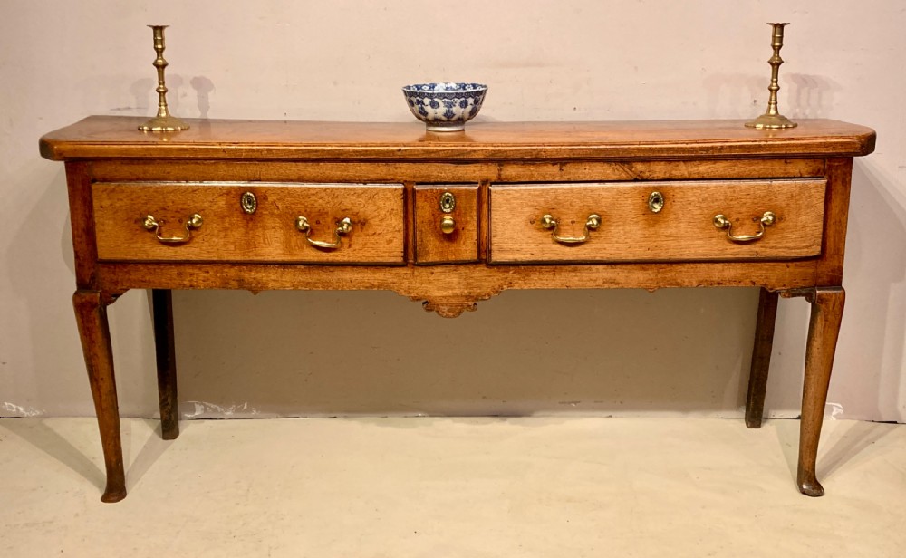 Georgian oak and elm dresser base .