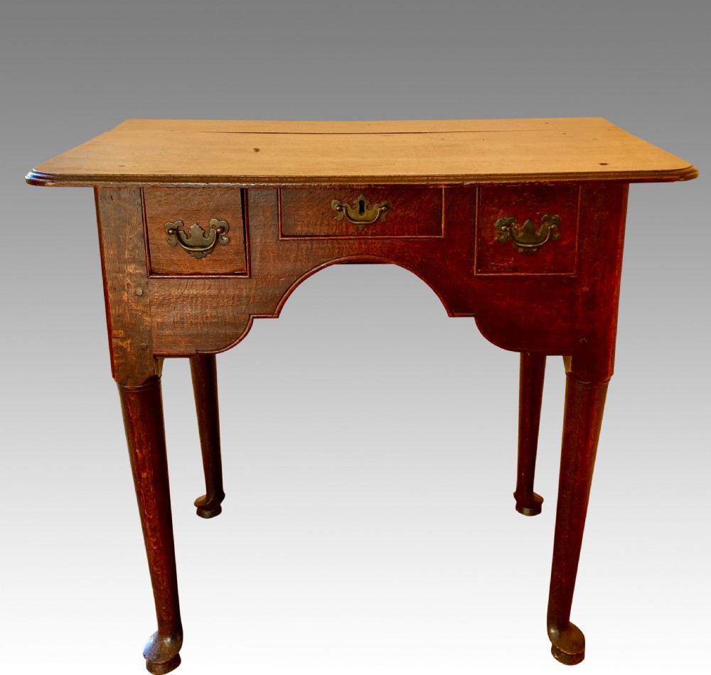 Georgian cabriole leg oak lowboy.