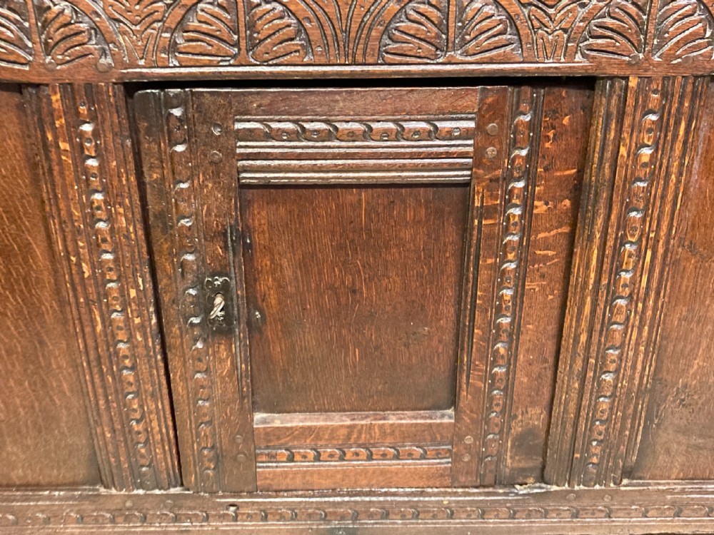 Charles II carved oak cupboard. View III
