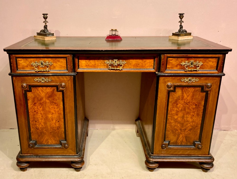 Victorian burr walnut pedestal desk.