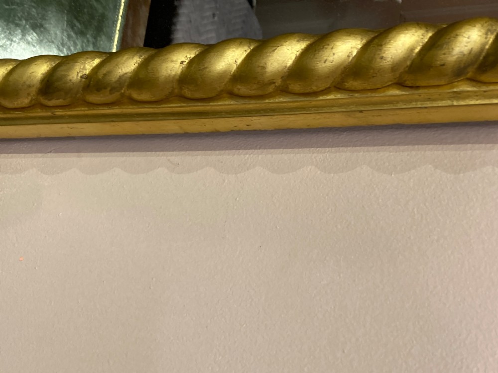 Regency carved giltwood pier mirror. View III