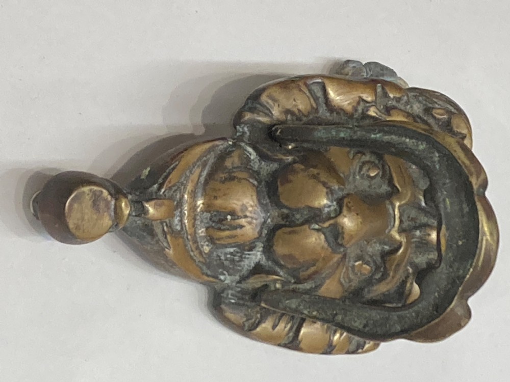 19th century lion’s mask brass door knocker. View IV