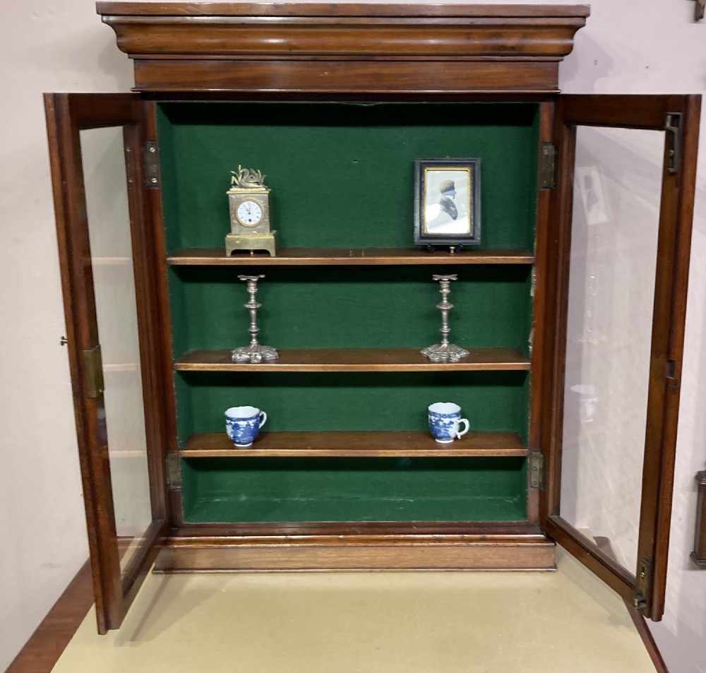 Small Victorian mahogany glazed door hanging cabinet. View IV