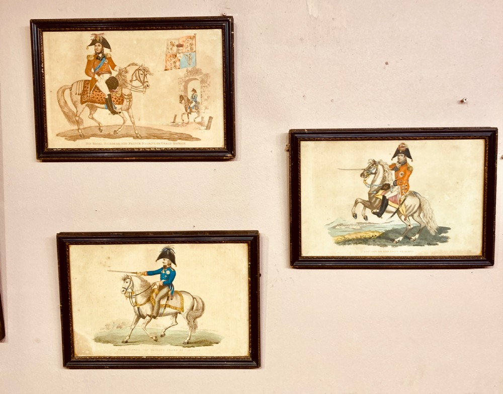 A set of three 19th century military coloured engravings .