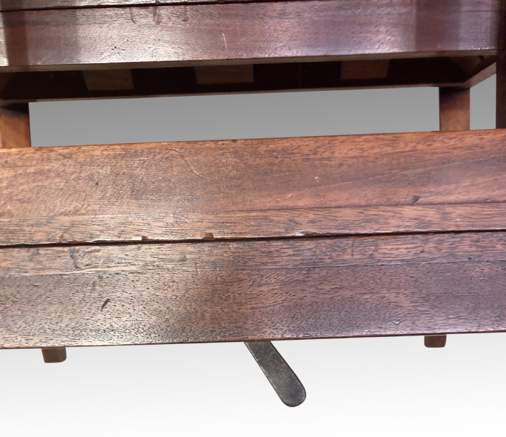 A Georgian mahogany armchair featuring a woven cane seat, scrolled armrests, curved legs, and a hinged convertible mechanism for library steps. View V