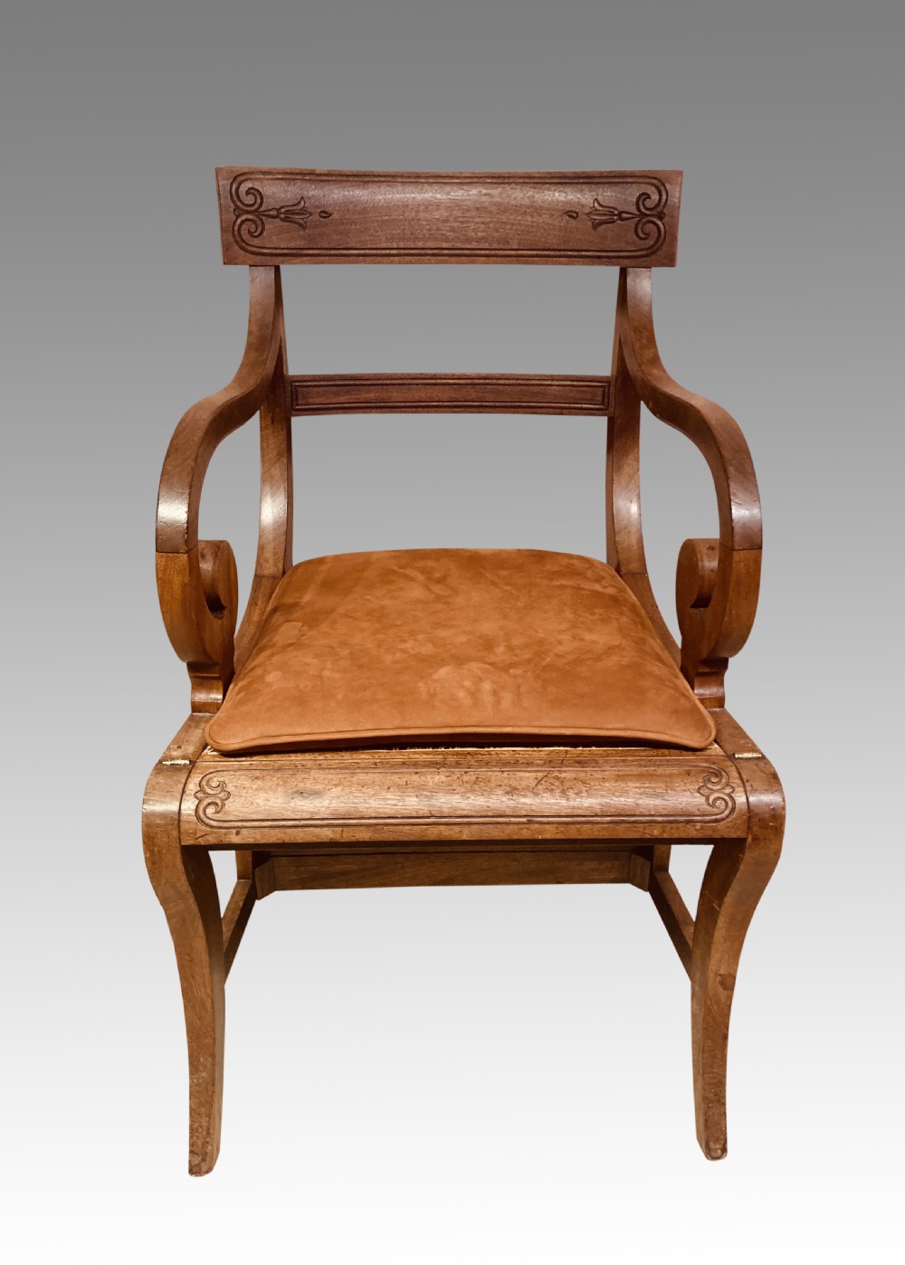 A Georgian mahogany armchair featuring a woven cane seat, scrolled armrests, curved legs, and a hinged convertible mechanism for library steps. View IX