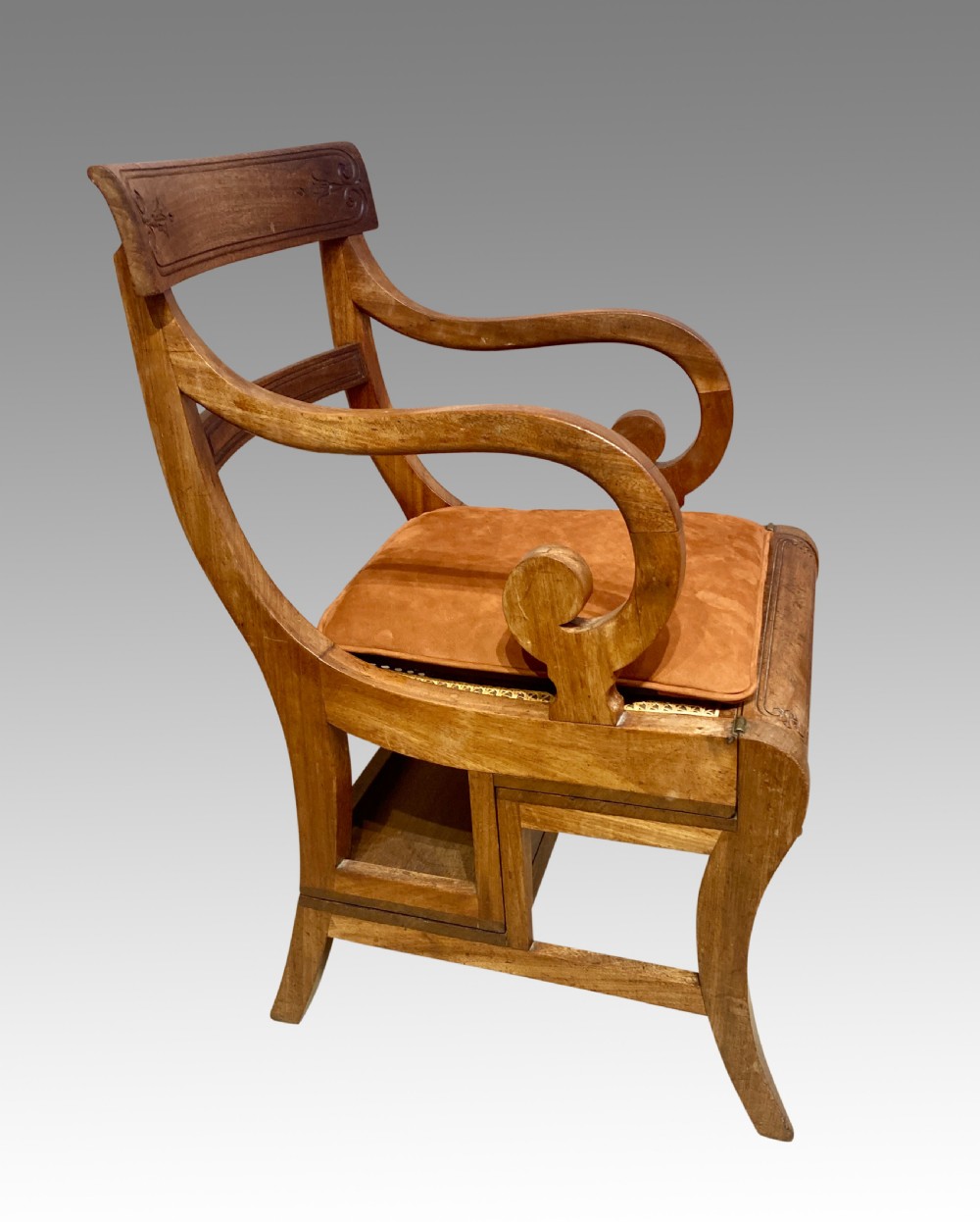 A Georgian mahogany armchair featuring a woven cane seat, scrolled armrests, curved legs, and a hinged convertible mechanism for library steps. View X