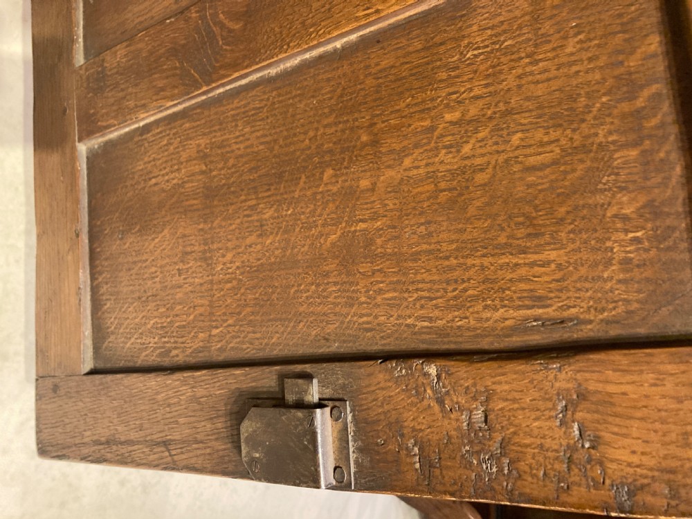 Small 19th century low oak cupboard.
 View V