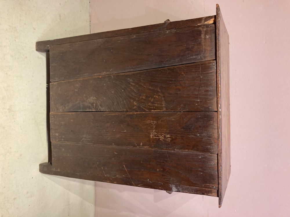 Small 19th century low oak cupboard.
 View VI