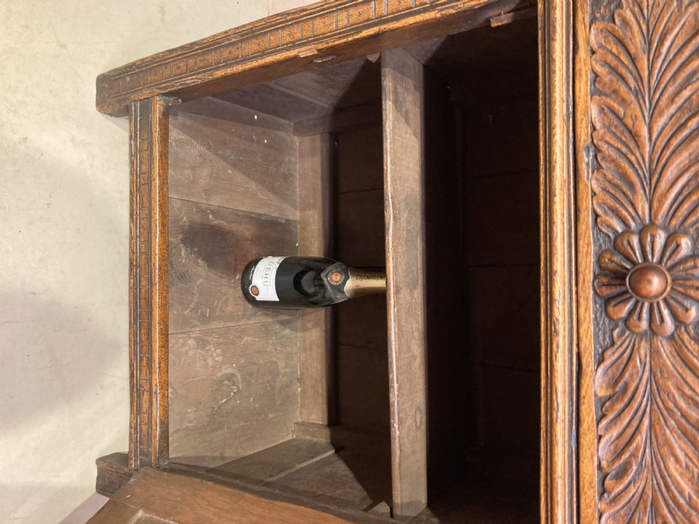 Small 19th century low oak cupboard.
 View VIII