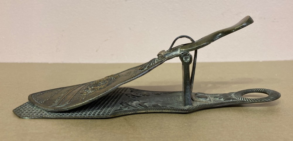Early Victorian brass paper clip. View IV