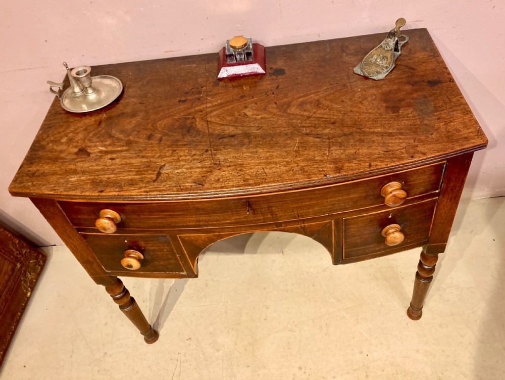 Georgian mahogany bow fronted side table. View II