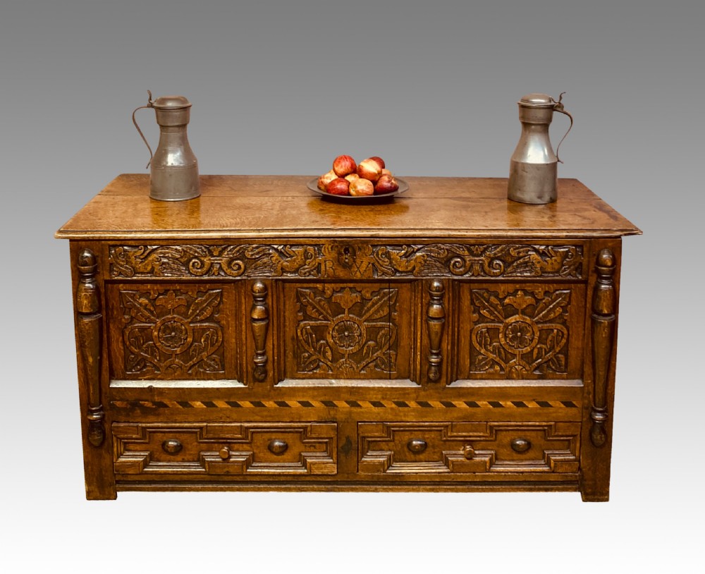 Charles II carved oak mule chest.