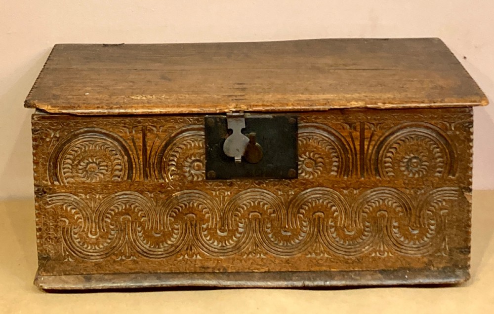A 17th century oak six plank box. 