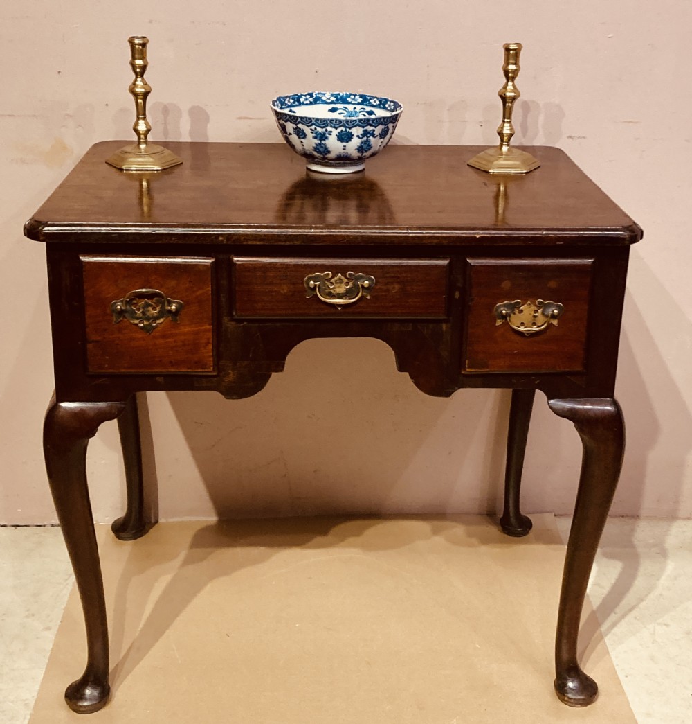 Geo II red walnut lowboy.