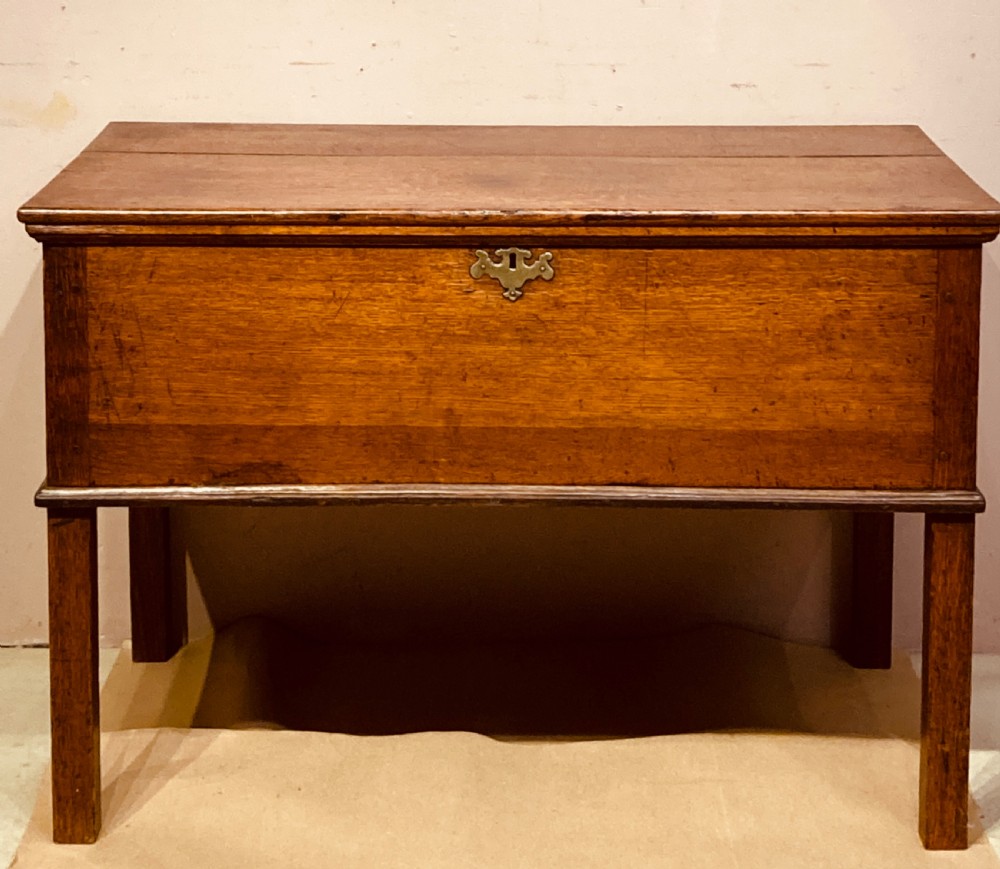 Georgian oak chest with fitted interior.