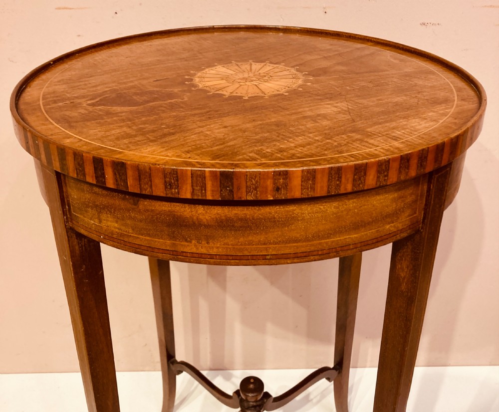 Antique circular inlaid mahogany lamp table. View III