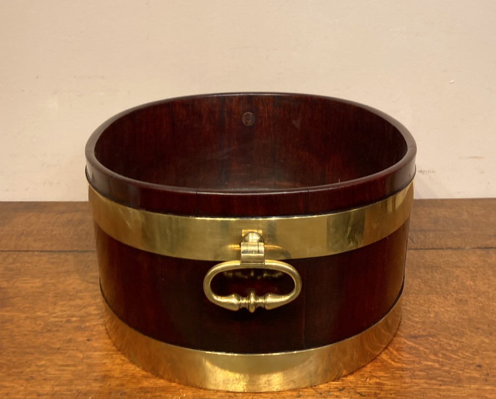 Geo III oval mahogany brass bound planter.  View II