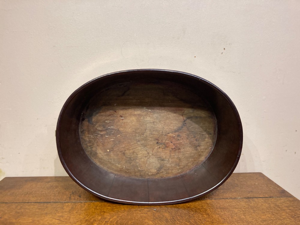 Geo III oval mahogany brass bound planter.  View V