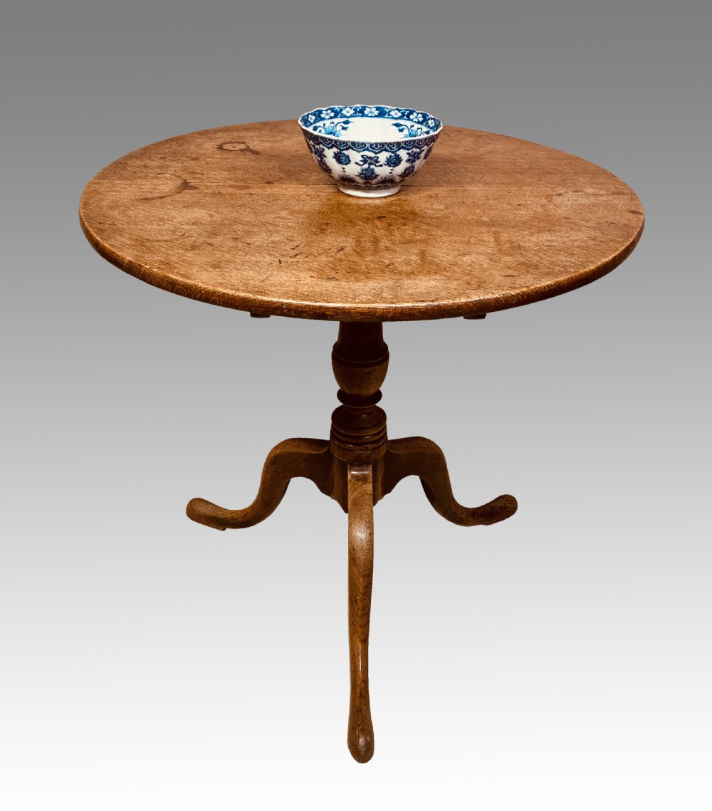 Georgian oak tilt top tripod table.