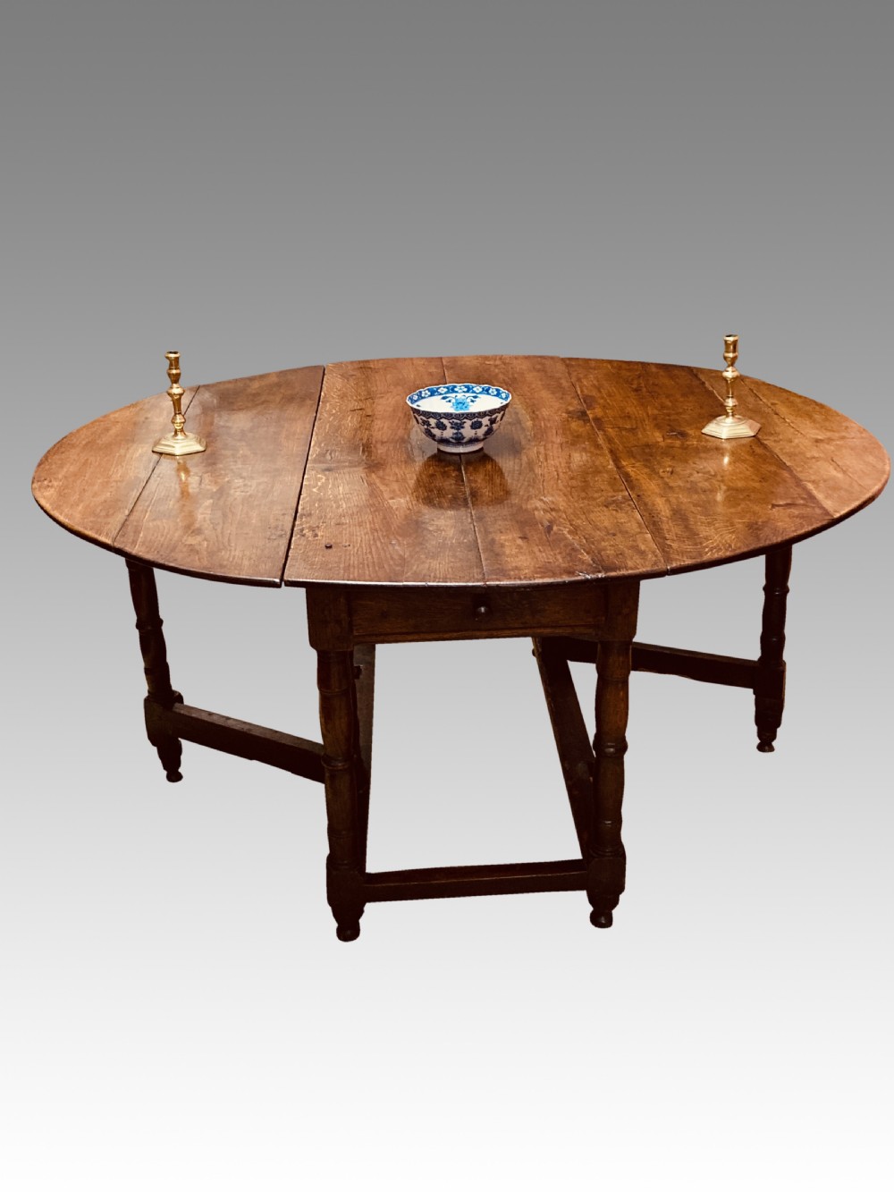 Queen Anne oak gateleg dining table.