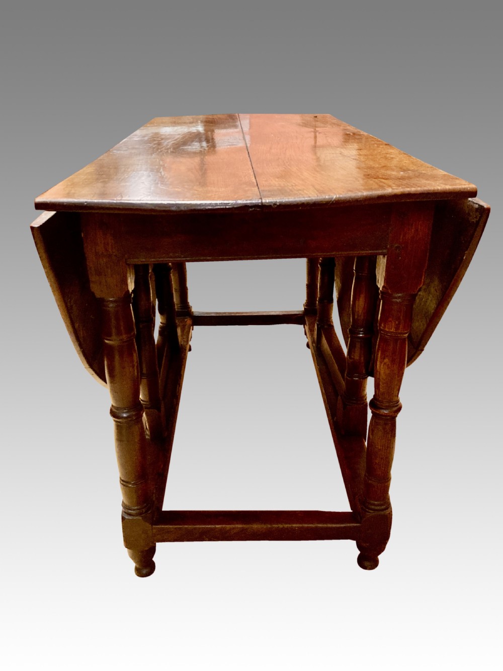 Queen Anne oak gateleg dining table. View VI