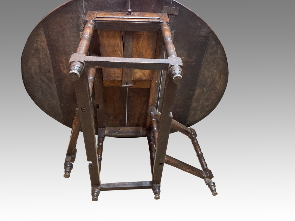 Queen Anne oak gateleg dining table. View IX