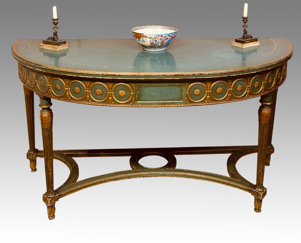 Antique painted and parcel gilt demi-lune console table.